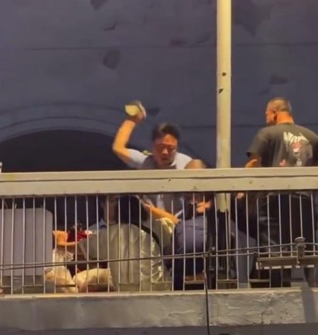Three urban management assistants detained after Wuhan overpass clash