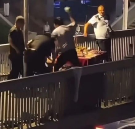 Three urban management assistants detained after Wuhan overpass clash