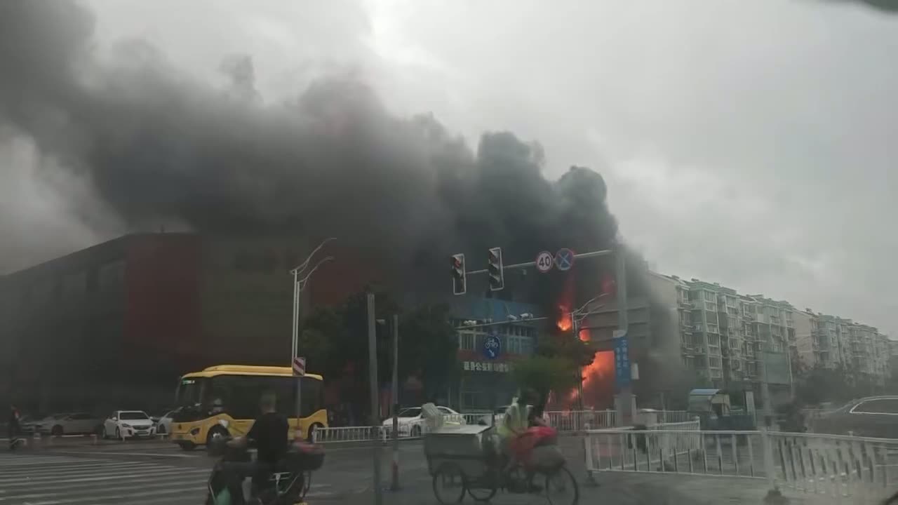 Post says vehicle fire sparked building blaze in Jiashan