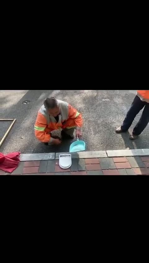Shijiazhuang Workers Weigh Roadside Dust